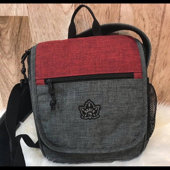 3/25$ Sac à main sport ROOTS